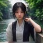 女性用户体验设计师正面肖像照,面带自然微笑,背景为浅色办公空间